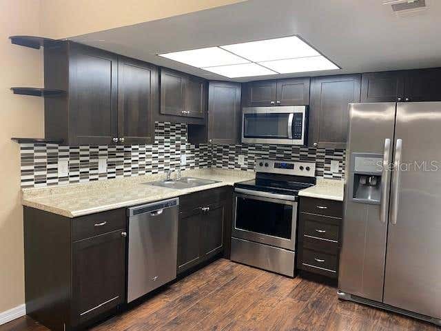 Photo of 92 Windtree Lane #L, Winter Garden, FL 34787 (MLS # O6434051)
