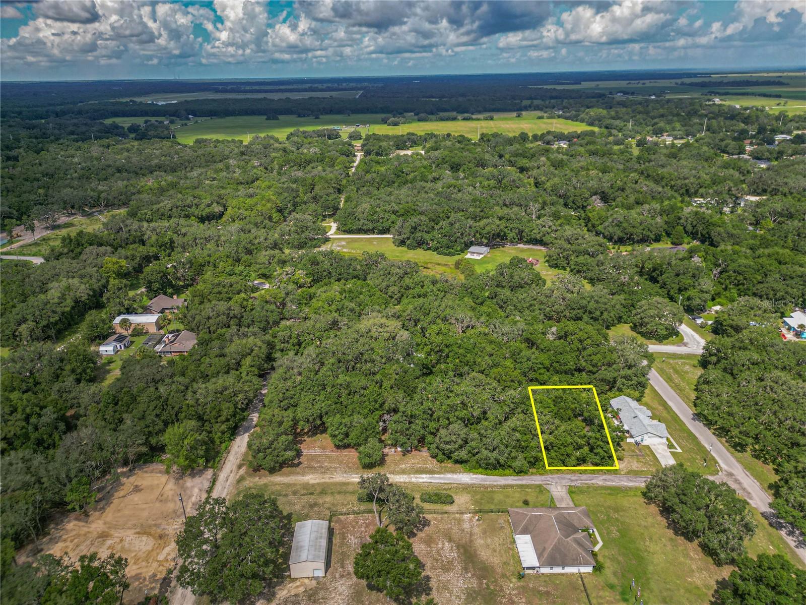 uild your dream home on this beautiful .22-acre lot in the sought-after community of Rolling Ranch Estates, known for its peaceful, rural charm and welcoming neighbors. Enjoy the tranquility
of country living while still being close to everything you need. This homesite offers easy access to Rolling Ranch Park, featuring picnic areas, playgrounds, walking trails, and sports courts.
Just minutes from KP Hole Park and the Rainbow River, you can enjoy tubing, kayaking, paddleboarding, and swimming in crystal-clear waters. Rainbow Springs State Park is minutes away for
hiking and wildlife viewing, with unique shops and waterfront dining nearby. Conveniently located near shopping, dining, and medical facilities in both Dunnellon and Ocala—plus quick access
to Ocala’s renowned equestrian venues—this lot offers the perfect blend of community, nature, recreation, and convenience, all with no HOA.