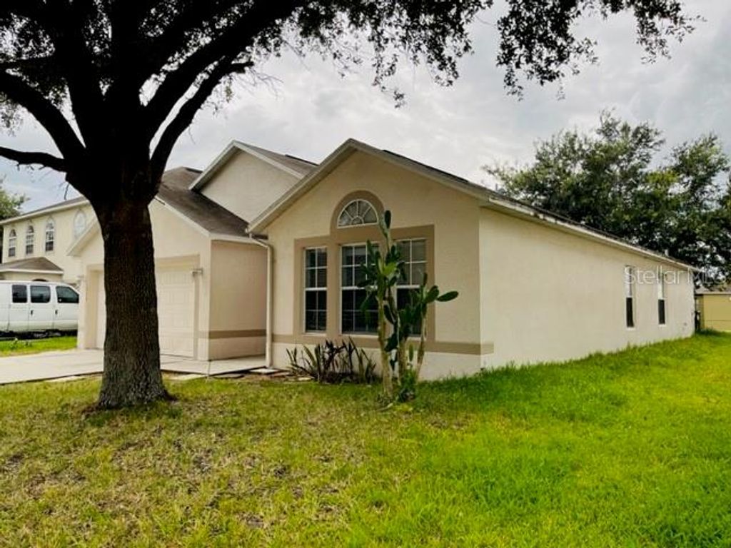 Photo of 115 Jefferson Boulevard, Davenport, FL 33897 (MLS # S5146168)