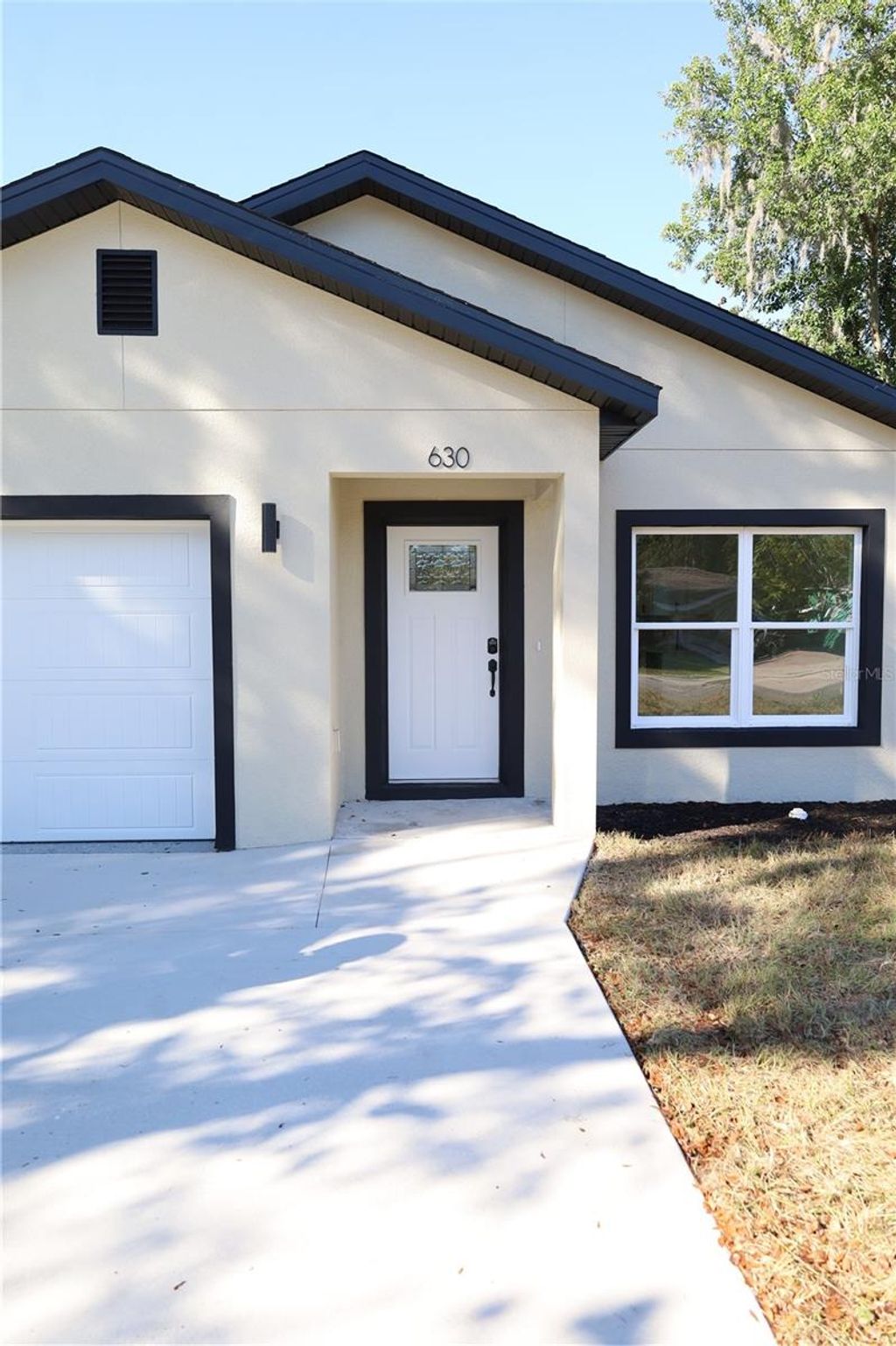 Photo of 630 S Adelle Avenue, Deland, FL 32720 (MLS # V4946245)