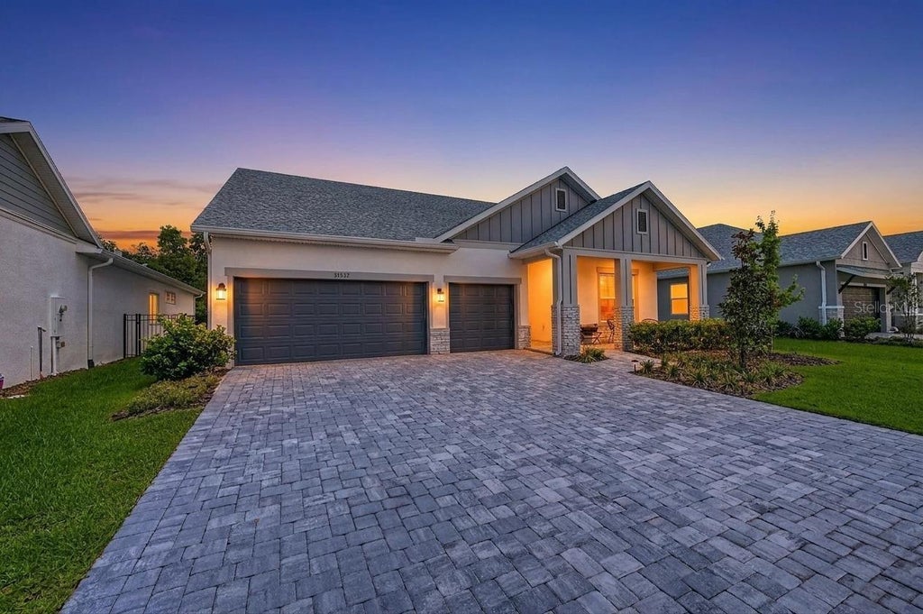 Photo of 31537 Hayman Loop, Wesley Chapel, FL 33543 (MLS # TB8524115)