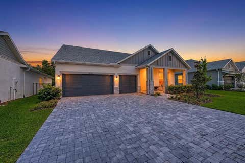 Photo of 31537 Hayman Loop, Wesley Chapel, FL 33543 (MLS # TB8524115)
