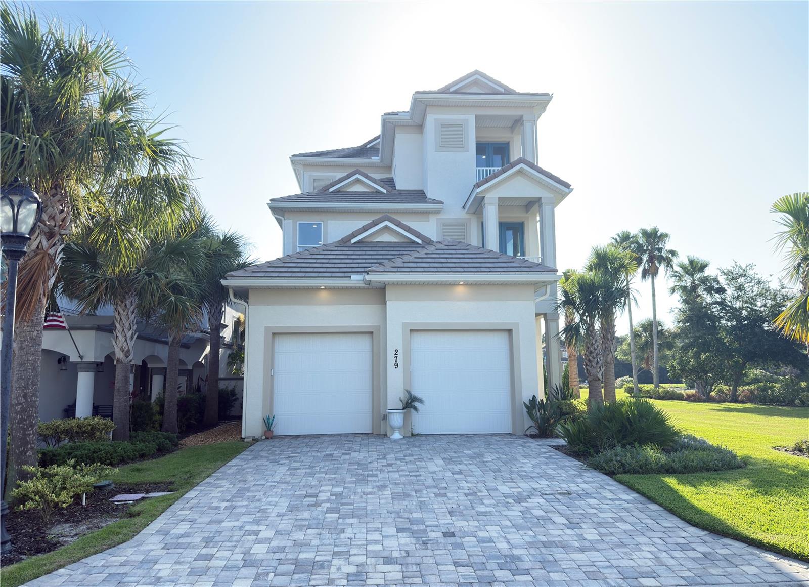 Welcome to 279 Yacht Harbor Drive, a custom-built single-family residence in the gated Yacht Harbor Village within Palm Coast’s Hammock Beach community. This exquisite newly completed three-story coastal residence perfectly blends luxury with relaxed waterfront living. The home boasts an open concept first floor with high-end kitchen appliances; choose the elevator to bring you to the second level which contains 3 bedrooms with bathrooms attached; and finally, the grand primary bedroom suite on the third floor. The home is located within a private saltwater canal that leads directly to the Intercoastal Waterway. The home is perfect for the boat lover with water access from your backyard, yet less than 2 miles to the pristine beaches of Hammock Beach.
Yacht Harbor Village is part of the exclusive Hammock Beach Golf & Spa Resort where optional membership provides access to two championship golf courses, tennis & pickleball, fitness center & full-service spa, fantasy water complex (lazy river, slides), beach access, fine dining and marina facilities.
279 Yacht Harbor Drive offers a rare blend of resort elegance, waterfront convenience, and low maintenance living in Palm Coast's most sought-after enclave. Reach out today to schedule your private tour of this coastal gem!