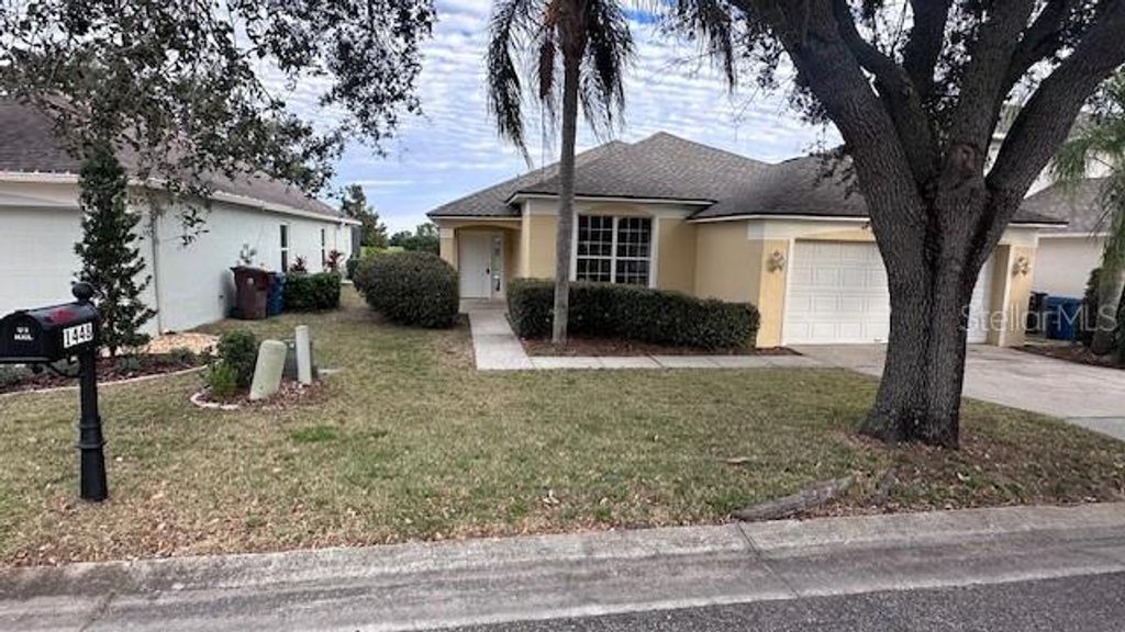 Photo of 1448 Park Place, Haines City, FL 33844 (MLS # A4679106)