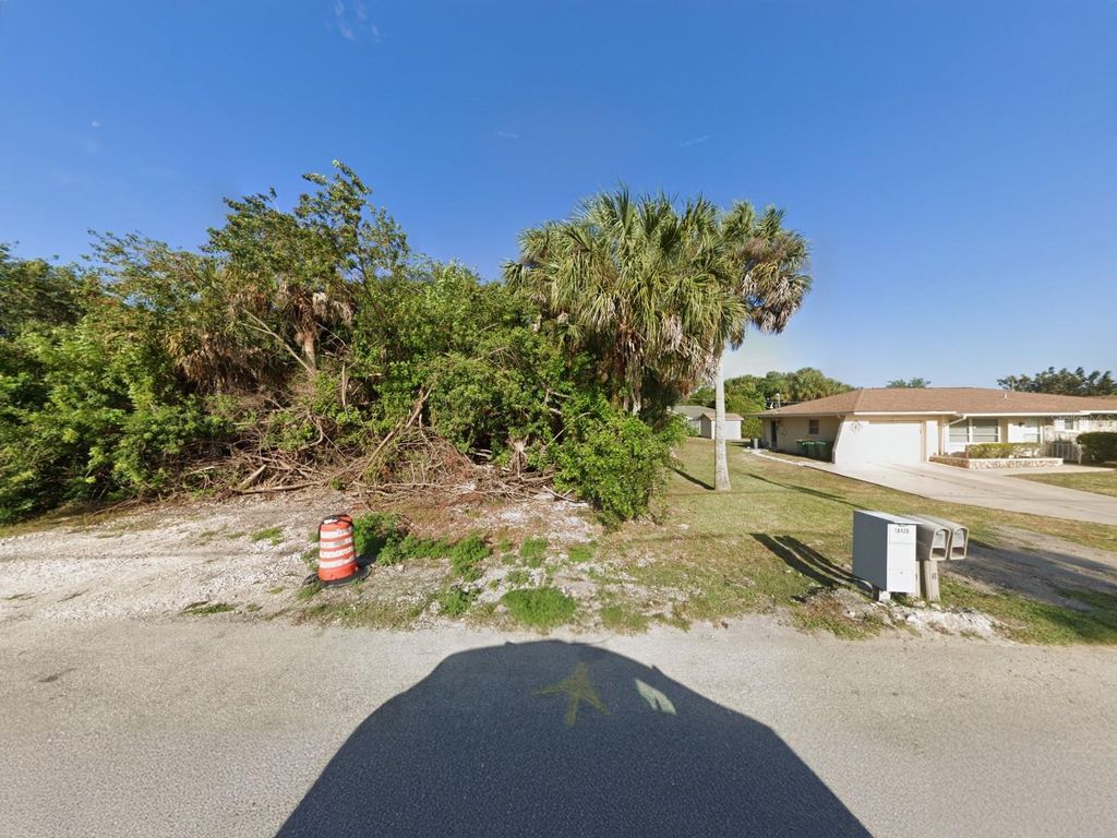 Photo of 18425 Driggers Avenue, Port Charlotte, FL 33948 (MLS # C7513722)