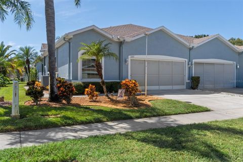 Photo of 11447 Golf Round Drive, New Port Richey, FL 34654 (MLS # TB8431418)
