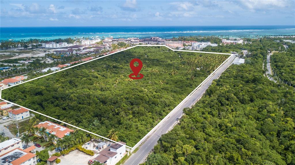 ***HUGE *** Vacant land with 33.60 Acres located in the best area of Bavaro, Punta Cana in The Dominican Republic. Ideal for residential and vacation, Villas, Condos, Hotel or shopping center development. Fully fenced. Just a few meters from the beach and all the fun. If you still need more acres for your development, we have an additional 11 acres that connect to this lot at an additional cost. We are open to a serious proposal. Bávaro is a place in the Verón Punta Cana municipal district, dependent on the Higüey municipality in the La Altagracia province, Dominican Republic. Bavaro/Punta Cana it has been transformed into a tourist services center due to the hotel and development expansion ; thus becoming an important tourist area of the country. Throughout the area there are dozens of hotels, among which the Spanish investment ones stand out, such as Riu, Iberostar, Be Live Grand Punta Cana, Meliá, Barceló, Palladium, Catalonia or BahÃa PrÃncipe. The area also has several nightclubs such as: Oro at Hard Rock Hotel, Imagine, Coco Bongo or Pachá, which enliven tourists' party nights. Numerous tourist attractions have been installed, some of a certain size such as the Manatà Park in Bávaro, a water park with manatees, dolphins and other kinds of animals. For tourists, the Punta Cana beach area is more popular because it is more affordable at international prices. However, Bávaro maintains the exclusivity and elegance that give it the title of best Caribbean beach. According to statistics from the Ministry of Tourism, in the Dominican Republic there was an investment in the tourist area of more than US$500M, representing a remarkable growth in this branch and consolidating tourism in the Dominican Republic as one of the best in the world. Only from the Punta Cana International Airport (PUJ) more than 2 million tourists and more than 5 million passengers in general enter each year.
