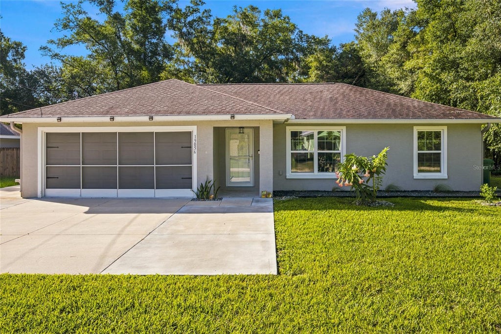 Photo of 19056 Saint Benedict Drive, Dunnellon, FL 34432 (MLS # OM730137)