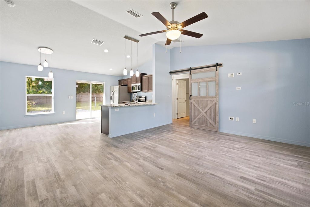 Photo of 19056 Saint Benedict Drive, Dunnellon, FL 34432 (MLS # OM730137)