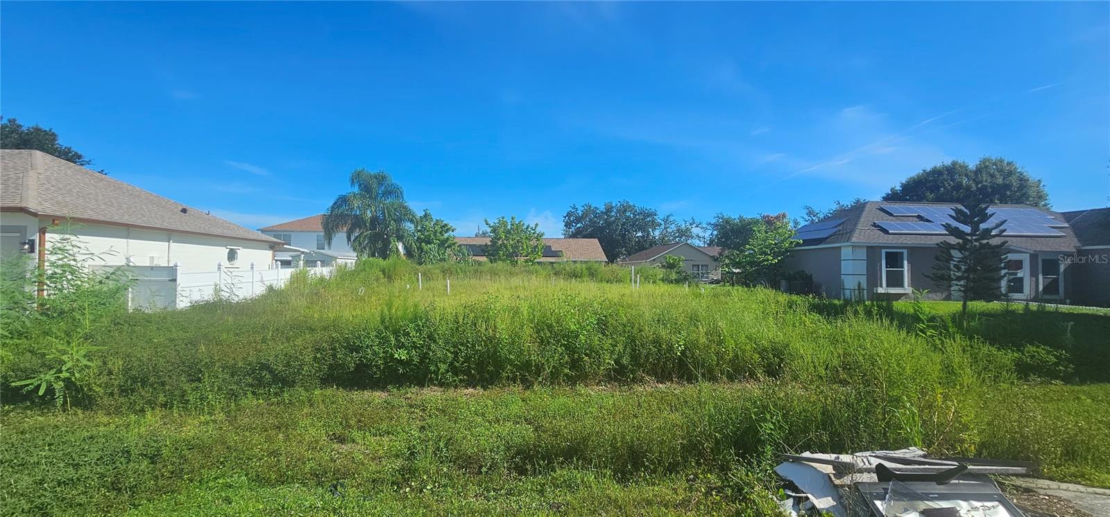 A remarkable advantage is that all impact fees have already been paid, saving you thousands and allowing you to start construction immediately. Excellent opportunity to build your dream home in the growing community of Poinciana Village 2 in Kissimmee, Florida. This 7,700 sq. ft. residential lot (0.17 acres) offers an ideal location surrounded by modern homes, parks, and convenient access to shopping, schools, and major highways leading to Orlando and world-class attractions. The property is zoned residential, not in a flood zone, and ready for development. The seller can also share the architectural plans of a beautiful home previously designed for the lot, providing inspiration and a head start for your project. Whether you’re an investor or a homeowner, this ready-to-build lot represents a smart and valuable opportunity in one of Central Florida’s most promising areas.