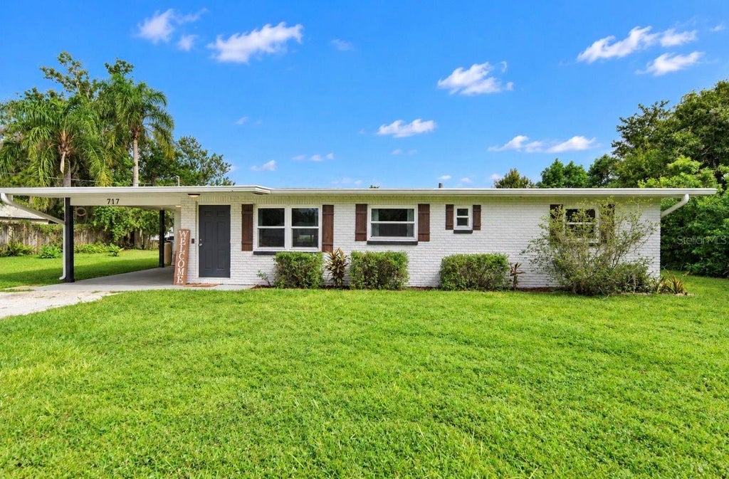 Photo of 717 W Deer Lake Drive, Lutz, FL 33548 (MLS # TB8552458)