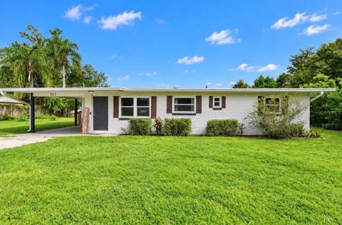 Photo of 717 W Deer Lake Drive, Lutz, FL 33548 (MLS # TB8552458)