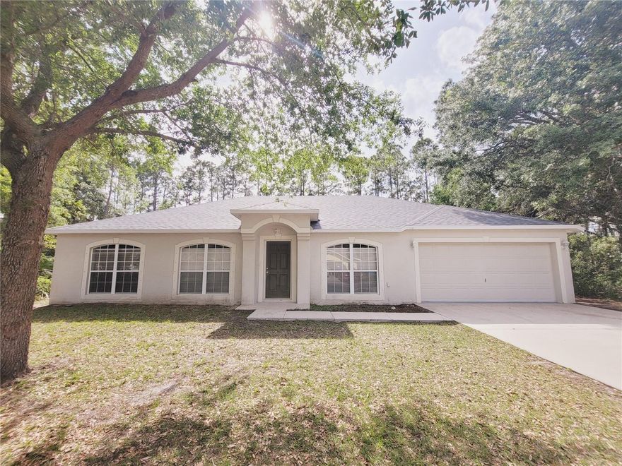 Spacious and functional 2236 SF fully renovated house with huge porch: 4 bedrooms/2 baths/2 cars garage w/garage door opener system. Split floor plan with formal dining, family, and living rooms, large open kitchen with eating area, island, breakfast bar, plenty of storage, vaulted ceilings, and architectural niches. The spacious master suite with double walk-in closets, three additional bedrooms, a guest bathroom, and a huge covered screened porch. Tile and ceiling fans in all areas, SS brand new appliances. Great location in a quiet street, a great neighborhood, close to schools, a community pool and sports Complex, churches, shopping, the New Town Center, and the beaches.