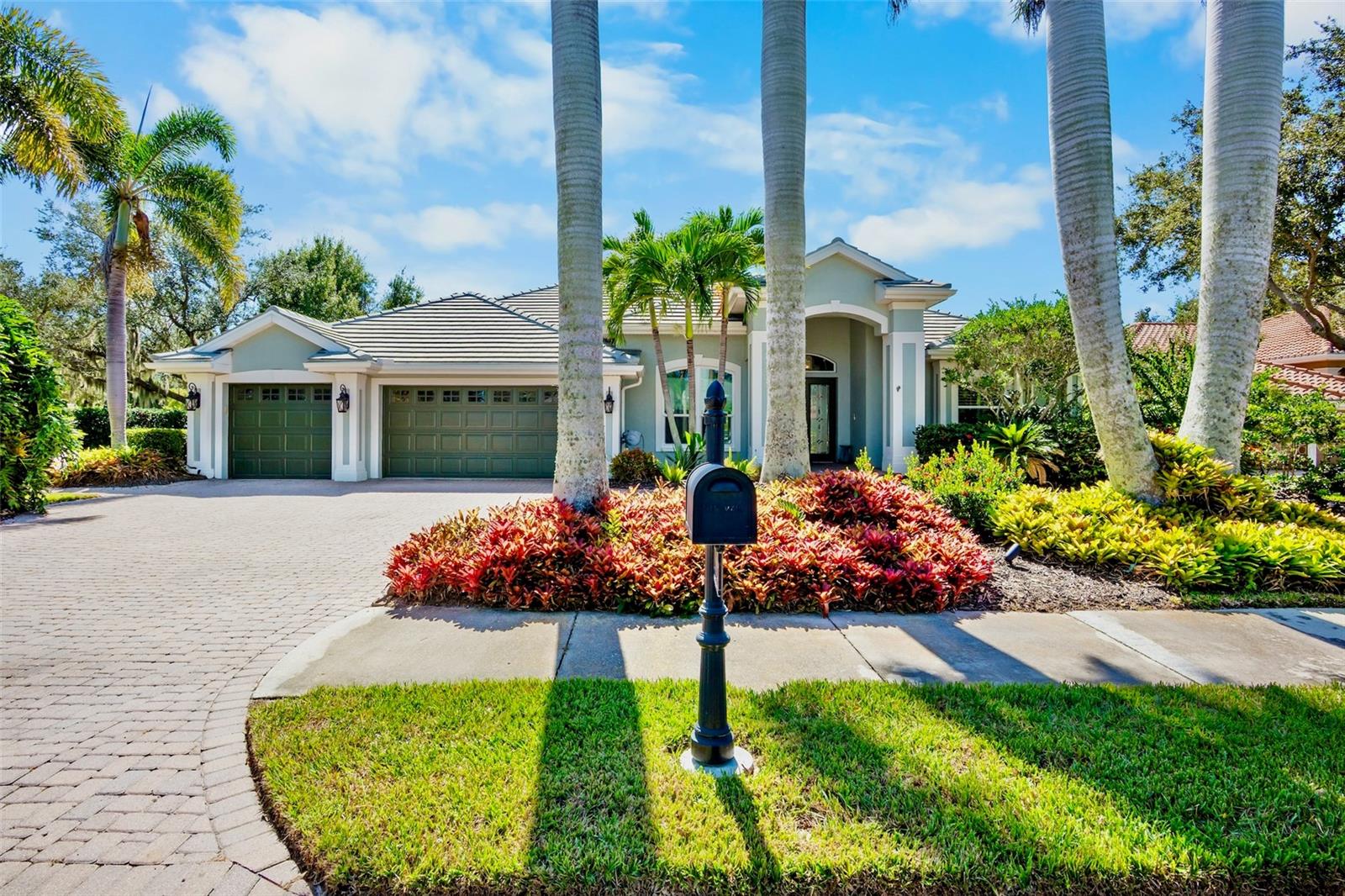 Welcome to Turtle Rock, where comfort, style, and the best of Florida living come together in this stunning custom-built WATERFRONT residence. Nestled within one of Sarasota’s most desirable gated communities, this well maintained home offers a thoughtful layout, timeless design details, and the perfect setting for both everyday living and entertaining. From the moment you arrive, you’ll be impressed by the INVITING CURB APPEAL, featuring a BRAND NEW ROOF $70,000.00 (November 2023), a semicircular paver driveway, and a spacious three-car garage with ample storage. Step through the grand double doors to discover an open, light-filled floor plan with SOARING CEILINGS, elegant double tray details with crown moldings, and a smart split design that enhances both privacy and flow, while the home’s ideal southern exposure fills the interior with natural warmth and brightness year-round. The primary suite provides a private retreat complete with walk-in closets with built-ins, beautifully updated cabinetry with double vanities, a soaking tub, and a walk-in shower, creating the perfect space to relax and unwind. The kitchen combines function and sophistication with wood cabinetry, a walk-in pantry, and premium stainless steel appliances including a 5-burner natural gas cooktop (Turtle Rock is a natural gas community), double ovens, and a Sub-Zero refrigerator, making it truly the heart of the home. Additional highlights include a flexible bonus room that can serve as a home office, den, media room, or fourth bedroom, custom built-ins, two AC units for enhanced comfort and efficiency, a whole-house water softener, hurricane-impact and energy-efficient windows $55,000.00 with new sliders (2021) providing added storm protection and potential insurance savings, a wet and dry bar for those casual moments with family and friends. Step outside to your private outdoor oasis featuring a travertine pool deck, screened-in lanai, heated pool and spa, new pool pump (2022), and new pool heater (2023). The summer kitchen is perfectly positioned for easy outdoor dining and entertaining,The recently updated 3rd bathroom conveniently located an ideal pool bath as well, while the serene waterfront setting and lush tropical landscaping create a peaceful, resort-style atmosphere.With a long list of amazing features, this beautiful home is truly a " MUST SEE " see to fully appreciate. Residents of Turtle Rock enjoy an array of amenities including a geothermal-heated community pool, tennis, pickleball, and basketball courts, scenic walking paths, and a vibrant community center with year-round social events. Conveniently located near shopping, dining, and entertainment, and just minutes from the Legacy Trail and world-famous Siesta Key Beach, this home offers the perfect blend of quality, location, and lifestyle—come experience the warmth and welcoming charm of this exceptional Turtle Rock residence, a place you’ll be proud to call home.