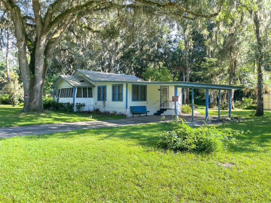 Wow!!!  A wonderfully kept home with acreage!!  This has original details left that most older homes do not have anymore.  Like original flooring and Trim.  It does need some TLC but it would not take much to make it the best home on the block.  It has a park like setting for a yard with the St Johns River at the end of the road.  This is definitely a jewel.
