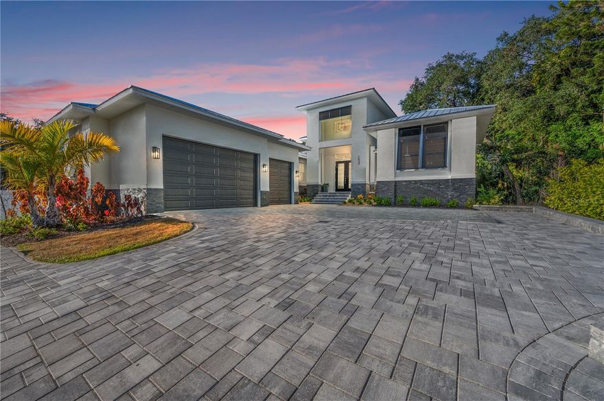 **Seller Financing Options Available** Introducing an exquisite new construction home nestled in the heart of Sarasota. Developed by M&J Pham Development, this stunning residence offers an unparalleled combination of luxurious comfort and unbeatable location. As you enter this dazzling property, you will be greeted by an open and spacious floor plan that features high ceilings, natural light, and high quality finishes throughout. The home features a modern and elegant kitchen with top-of-the-line Viking appliances, quartz countertops, and custom cabinetry. Two patios with an outdoor kitchen and additional island seamlessly blend indoor and outdoor living with meticulously planned landscaping and pool area. Continuing on the first floor you will find a well-appointed ensuite bedroom, complete with a private bathroom and walk-in closet for added convenience and comfort. A stylish and functional office provides a designated workspace, while a separate laundry room offers a practical solution for cleaning and organizing clothes and linens. The master bedroom of this gorgeous home is a true sanctuary, offering a plush and peaceful retreat after a long day. It boasts an ample layout with plenty of room, and large windows to let in unrestricted natural light, providing a bright and airy feel that's perfect for relaxation. The room also features a generously sized walk-in closet with abundant space for storage and organization as well as a private terrace for you to easily enjoy the outdoor scenery. The master bathroom is equally impressive, featuring a shower that's great for unwinding after a long day. The opulent finishes and high-end materials used throughout the space add to the lavish feel of this spectacular master suite, making it the best place to recharge and rejuvenate. As you ascend the grand staircase to the upper level of the lavish estate, you are greeted with a breathtaking sight of two cozy bedrooms, each with its own private ensuite bathroom and a large balcony that has peekaboo views of beautiful Sarasota Bay. Situated between Siesta Key and Downtown Sarasota, you will have easy access to some of the best beaches, restaurants, and shopping that Sarasota has to offer. Whether you are looking for a day at the beach, a night out on the town, or a quiet evening at home, this home has everything you need.