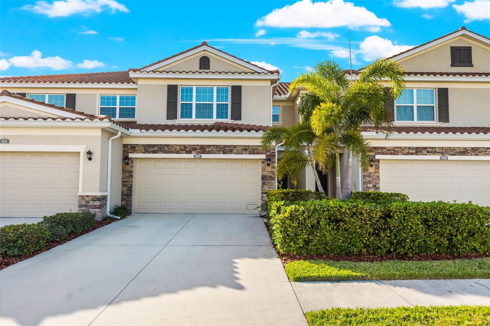 Experience the essence of "home" in this 2018 beautifully designed townhome, offering the perfect blend of modern style and comfort. Constructed with concrete block on both levels and featuring a tile roof, this home is built to last. Recently painted exterior with a 10-year warranty in fall of 2024, it is located in a non-flood zone and has experienced no storm damage or power loss, even during the 2024 hurricane season.
The thoughtfully designed open-concept floor plan includes several key updates: downstairs recessed lighting, a custom pantry from The Container Store, and the entire home painted in a neutral Sherwin Williams Worldly Gray. The kitchen boasts Quartz Silestone countertops in Miami White, an oversized kitchen sink with an upgraded faucet, and a screened-in lanai with a paver pad for your grill. The half bathroom also features Quartz Silestone countertops, and there is upgraded door hardware throughout. Additional enhancements include a frameless shower door, washing machine and dryer from 2023, custom window framing, and sealed tile flooring grout as of July 2024. Designer light fixtures complete the modern aesthetic.
Conveniently located near the entry to the 2-car garage is a half bath. Additional storage is available under the stairs. Upstairs, you’ll find a spacious laundry room and three generously sized bedrooms—all with walk-in closets. The large primary suite includes a convenient en-suite bathroom with dual sinks and a granite top vanity. Two additional bedrooms on the opposite side of the home ensure optimal separation and privacy. A built-in desk nook outside the second bedroom offers the perfect spot for organizing paperwork or tackling homework.
Situated in a gated community of approximately 130 homes, residents enjoy access to a resort-style pool and a pavilion—perfect for social gatherings. All of this is just minutes from downtown, with easy access to top dining, shopping, and major highways. Enjoy a short walk to Metro Diner, Red Mesa, Bonefish Grill, Starbucks, and more!
