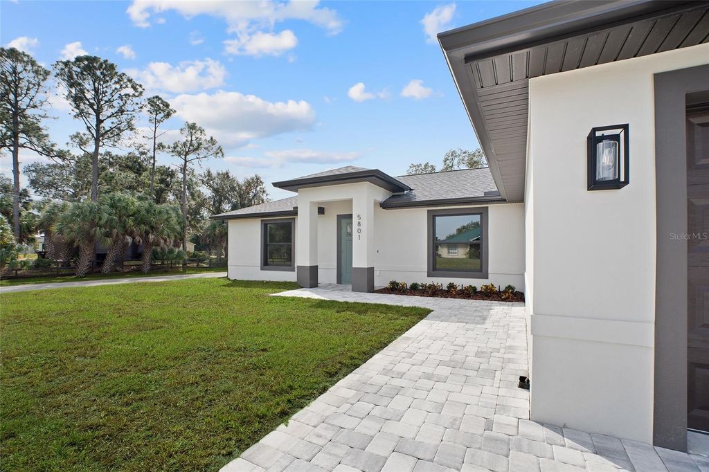 Photo of 5801 Ferendina Street, North Port, FL 34291 (MLS # A4672383)