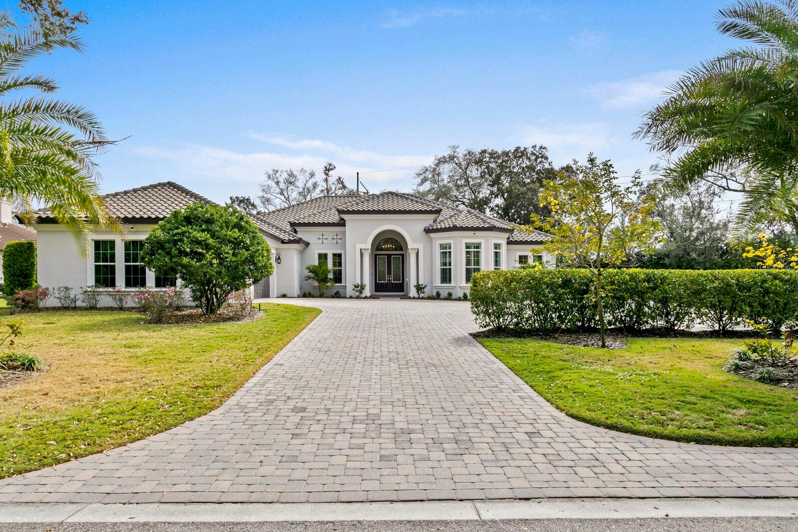 STUNNING SINGLE STORY EXECUTIVE HOME LOCATED IN AVILA, TAMPA’S PREMIER GUARD GATED, GOLF & COUNTRY CLUB COMMUNITY. NESTLED AT THE END OF A CUL-DU-SAC IN THE PEACEFUL AREA OF COMUNIDAD DE AVILA THIS SPECTACULAR HOME, BUILT IN 2017, OFFERS THE ULTIMATE IN AMENITIES, AND SPACE. THE AUTHUR RUTENBURG, BERMUDA MODEL, GREAT ROOM PLAN, FEATURES 4 BEDROOMS, 3 FULL BATHS, FORMAL OFFICE, BONUS ROOM, BRIGHT, OPEN PLAN, OVERLOOKING THE SPARKLING SALT- WATER POOL, PANARAMIC SCREENED CAGE, SPACIOUS LANAI, AND LARGE FENCED BACKYARD. UPON ENTERING THE DOUBLE DOORS, YOU WILL BE TAKEN ABACK BY THE OPEN VISTAS, SOARING CEILINGS, RICH AMENITIES, INCLUDING A CHEF’S DELIGHT GOURMET KITCHEN, WITH STAINLESS STEEL APPLIANCES, WINE COOLER, HIDDEN WALK-IN PANTRY, AND SPACIOUS GRANITE COUNTERTOP AREAS. THE LUXURIOUS PRIMARY SUITE IS PRIVATELY SITUATED, HAVING AN IMPRESSIVE SPA BATH, DUAL SINK AREAS, DUAL CUSTOM CLOSETS, AND A SPACIOUS BEDROOM WITH SITTING AREA, CREATING A SERENE RELAXING SPACE. THE MANY AMENITIES INCLUDE, DETAILED CEILING TREATMENTS, ABUNDANT CLOSET SPACE, POCKETING SLIDING GLASS DOORS, DESIGNER CEILING FANS, PLANTATION SHUTTERS, GOURMET GARAGE, EV-CHARGING STATION, SECURITY SYSTEM, AND LARGE PRIVATE LOT, WITH ROOM FOR EXPANSION. CONVENIENT TO DOWNTOWN TAMPA, ST. JOSEPH NORTH, RESTAURANTS, AND PUBLIX! 3,744 SQ. FT Bedroom Closet Type: Walk-in Closet (Primary Bedroom).
