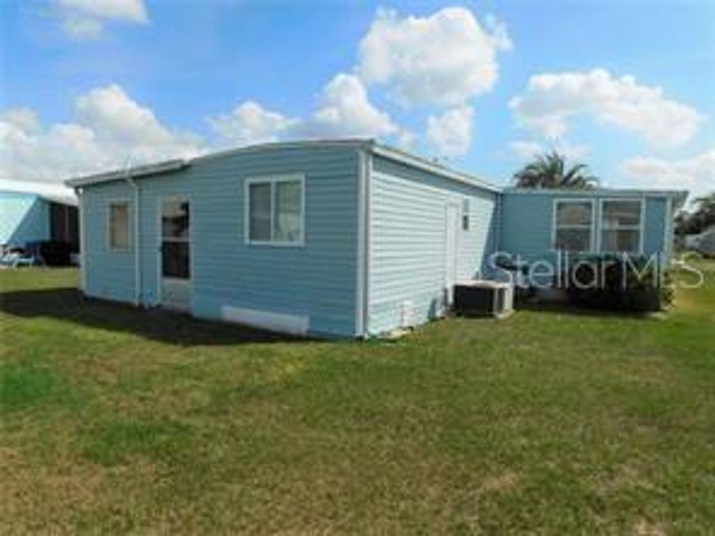 Photo of 36941 Grace Avenue, Zephyrhills, FL 33542 (MLS # TB8437972)