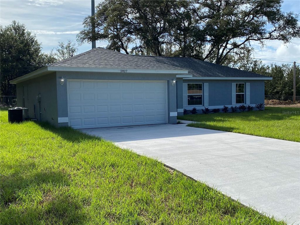 Photo of 2827 SW 140th Loop, Ocala, FL 34473 (MLS # OM714964)