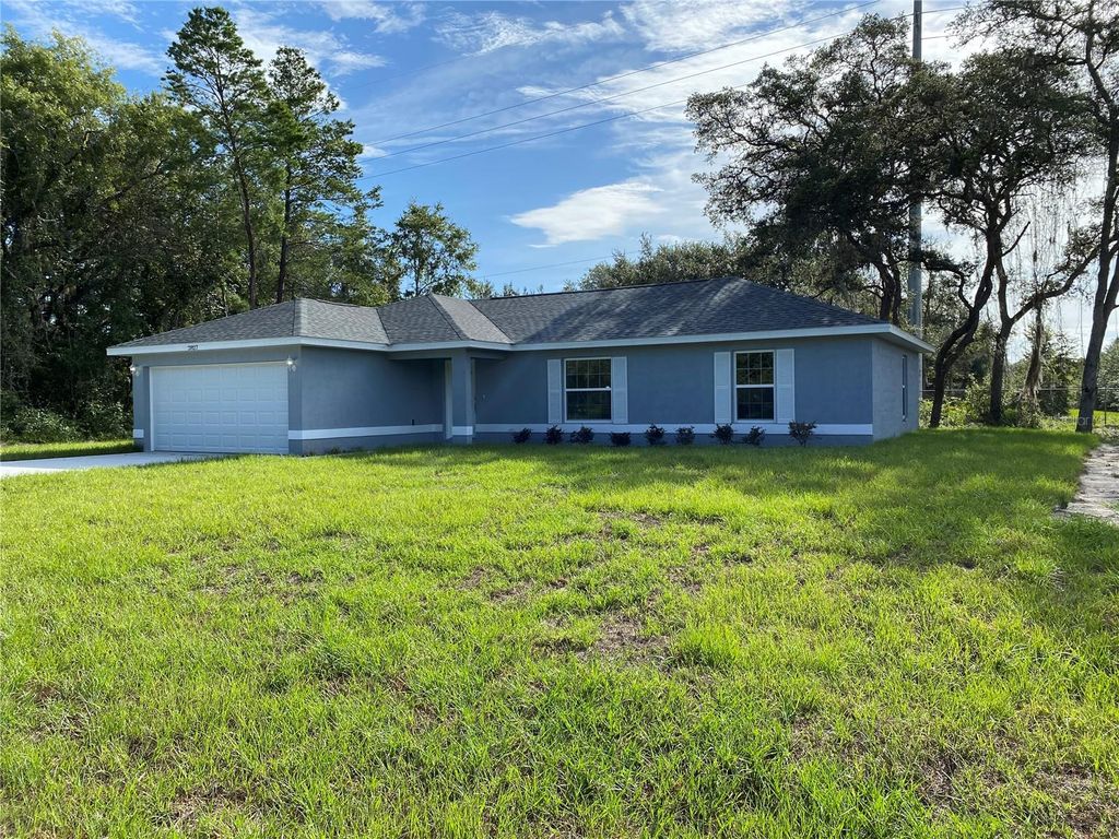 Photo of 2827 SW 140th Loop, Ocala, FL 34473 (MLS # OM714964)