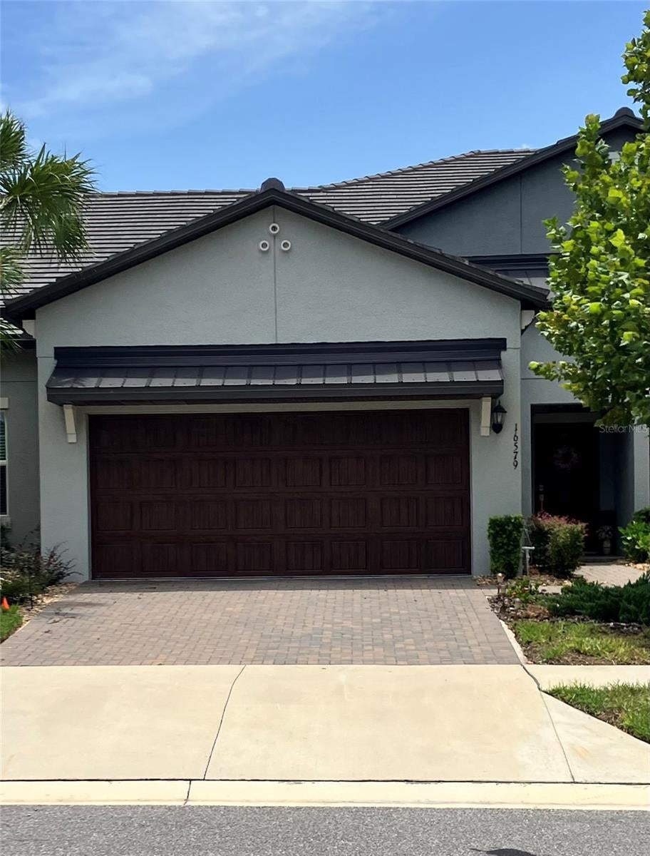 Photo of 16579 Shell Bay Drive, Land O Lakes, FL 34638 (MLS # W7887913)