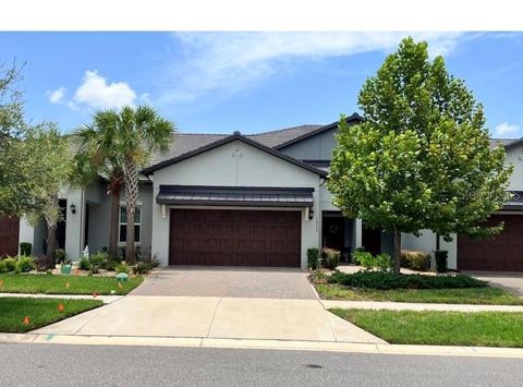 Photo of 16579 Shell Bay Drive, Land O Lakes, FL 34638 (MLS # W7887913)