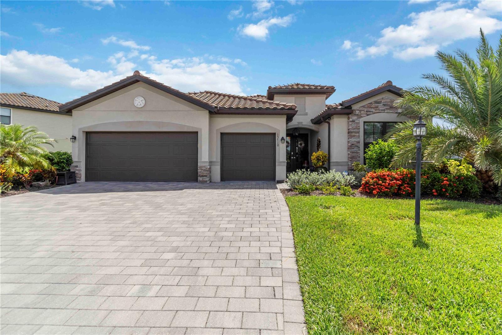 Lakewood Ranch Living at Its Finest – ALL IMPACT GLASS, GENERATOR, Pool, Oversized Lot & More!
Welcome to your Florida dream home in the vibrant, resort-style community of Lorraine Lakes in Lakewood Ranch! This beautifully upgraded single-family residence offers the perfect blend of luxury, comfort, and functionality on an oversized lot with tranquil pond views and stunning sunsets.
Step inside to discover 3 spacious bedrooms, 3 full bathrooms, a versatile den, quartz countertops and stylish all-tile flooring throughout. The open-concept layout features a chef’s kitchen with a massive center island, gas range, walk-in pantry, and newly painted interiors for a fresh, modern feel. The light-filled great room boasts a tray ceiling, ceiling fan, and seamless access to the extended screened lanai—complete with a heated pool and spa, retractable sun awning, and plenty of space to relax or entertain in style.
Enjoy peace of mind with all impact glass windows, a whole-house generator, and storage racks in the garage. The primary suite is a true retreat with dual walk-in closets, a spa-like bathroom featuring a large walk-in shower and dual vanities.
Located in a top-rated school district and within a premier amenity-rich community, residents of Lorraine Lakes enjoy access to three resort-style pools, a clubhouse with restaurant, fitness center, aerobics studio, splash park, tennis, basketball, pickleball, volleyball, bocce, playground, and a full calendar of events curated by a dedicated lifestyle director.
This home offers it all—luxury features, serene views, and unbeatable community amenities. Schedule your private showing today and experience the best of Lakewood Ranch living!