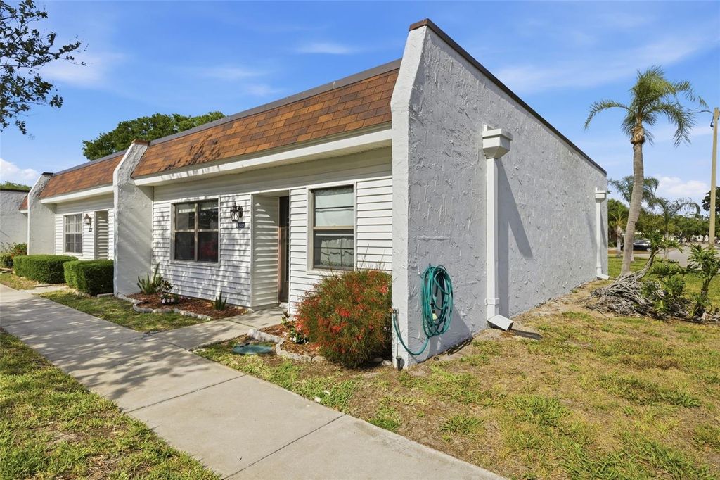 Photo of 9023 Mission Oaks Boulevard #F, Seminole, FL 33776 (MLS # TB8502120)