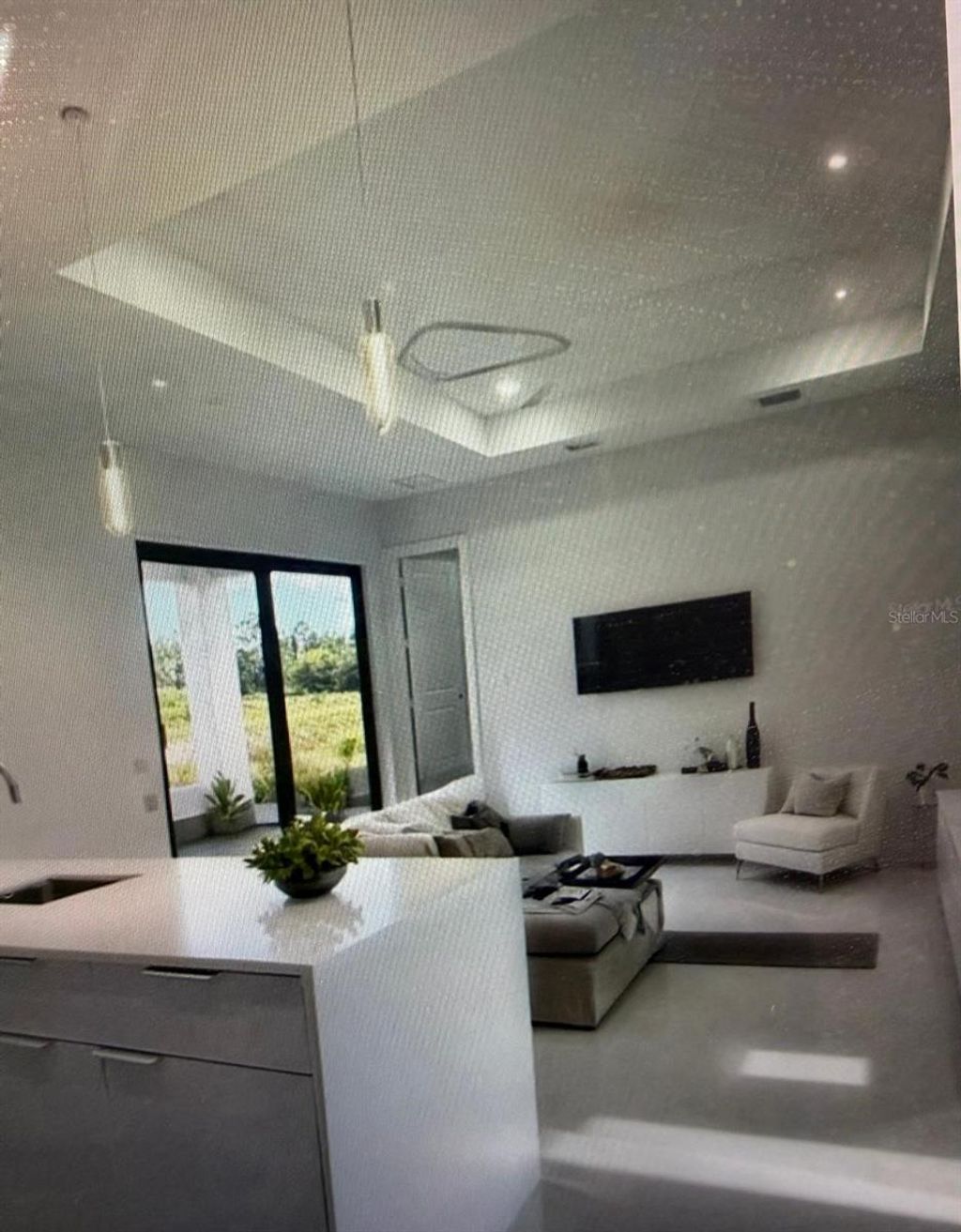 Photo of 704 Mindora Avenue, Lehigh Acres, FL 33972 (MLS # GC538155)