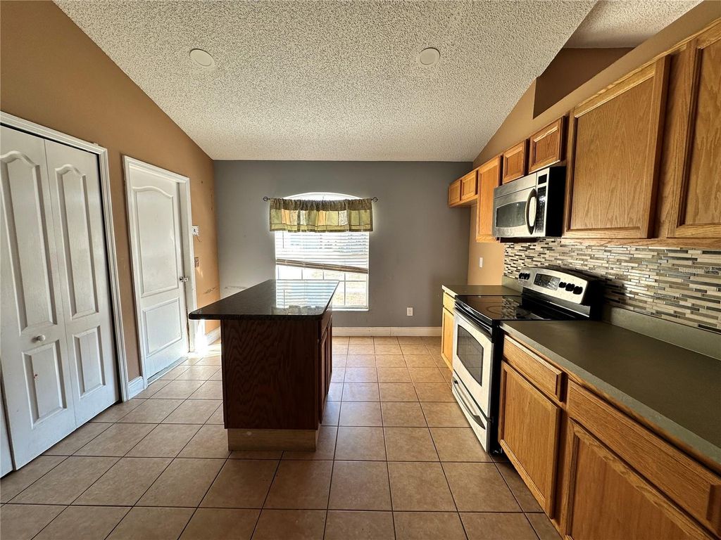 Photo of 256 Grouper Court, Kissimmee, FL 34759 (MLS # L4959001)