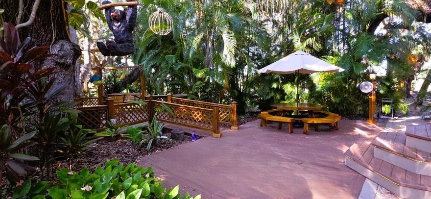 Own a Stunning Luxury RV Lot in CENTRAL FL! Welcome to RIVER RANCH RV RESORT, Florida’s Luxury RV Resort with access to Lake Kissimmee!  Step into Bear Trail in the gorgeous and desirable PHASE 3 of this Central FL Luxury Resort! Enjoy canopy oaks and beautiful landscape with No Rear Neighbors!  This lot features complete privacy, shade, lush landscape and all the extras that you look for in an RV Lot.  This space is Big Rig friendly, offers several cozy seating areas to include a custom made dining table, a built in fire pit with TV and a 8 seater firepit conversation/eating table.  There is a paver walkway that leads to a shed with electric and a paved RV service side.  Plenty of parking for a golf cart and vehicle.  Looking for entertain and fun?  River Ranch offers it here!!   For starters, there is a LIVE Rodeo every Saturday night – an excellent display of showmanship and fun for the entire family! There is even a Saloon (family friendly), with LIVE bands, DJs, dance parties and they give line dancing lessons for free.  There is an adventure park which has a bounce house, mechanical bull, climbing tower, Arcade, mini golf, outside movie on the greens, bicycle rentals, airboat rides, river boat rides, swamp buggy, hayrides, petting farm, trap & skeet range and a bow target for shooting. There are several places to eat on property.  The River Ranch Chop House serving delicious food and drinks, a waterfront Smokehouse Grill serving delicious BBQ, a pizza shop and an ice cream and coffee shop (serving Starbucks.) There is also a General store and a Western store to grab all of your favorite Cowboy/Cowgirl finds! Watch the Bison, Steers, Horses and other wildlife!  Don’t forget to check out the Petting Farm!!