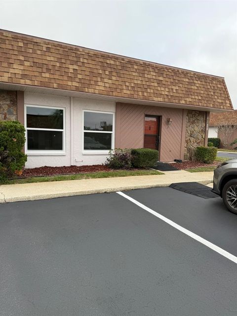 Photo of 6125 Chesham Drive #1, New Port Richey, FL 34653 (MLS # TB8455620)