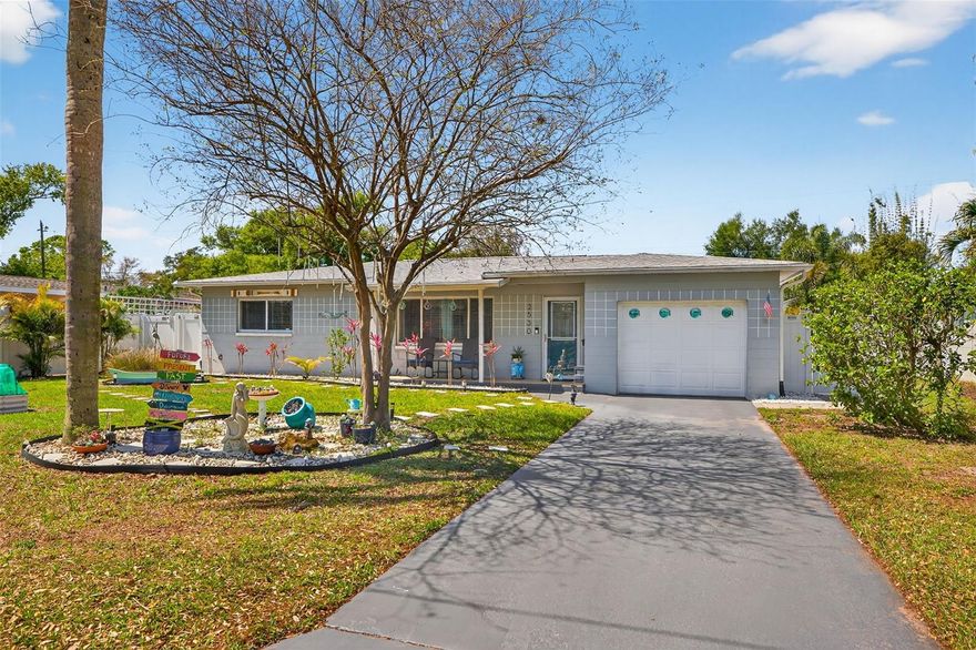 Welcome to your own private Florida oasis. This beautifully updated 2-bedroom, 1-bath solid block home with a Florida room offers the perfect blend of comfort, style, and peace of mind. Every inch of the home has been thoughtfully updated, and the backyard is truly a showstopper with a semi-inground, custom-built, 15'x30' saltwater pool, artificial turf, pavers, mature landscaping, a built-in weatherproof Lifetime swing set, outdoor solar shower, screened-in porch, and covered pergola. Designed for easy living, the rear of the home features mirror-tinted windows to help reduce energy costs and keep summer electric bills low. Inside, both bedrooms are generously sized enough for king beds, and the Florida room provides flexible space for an additional living area, office, or potential third bedroom. Major updates include the roof, A/C, and windows in 2022, and water heater in 2024. Additional highlights include epoxy garage floors, an Amazon smart thermostat with Alexa connectivity, whole-yard irrigation, and a 360-degree Ring camera alarm system. Ideally located near Downtown St. Pete and the Gulf beaches, this home truly has it all.
