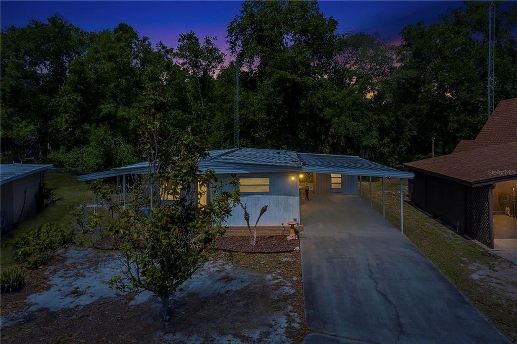 Photo of 31 Woodland Circle, Haines City, FL 33844 (MLS # P4938645)
