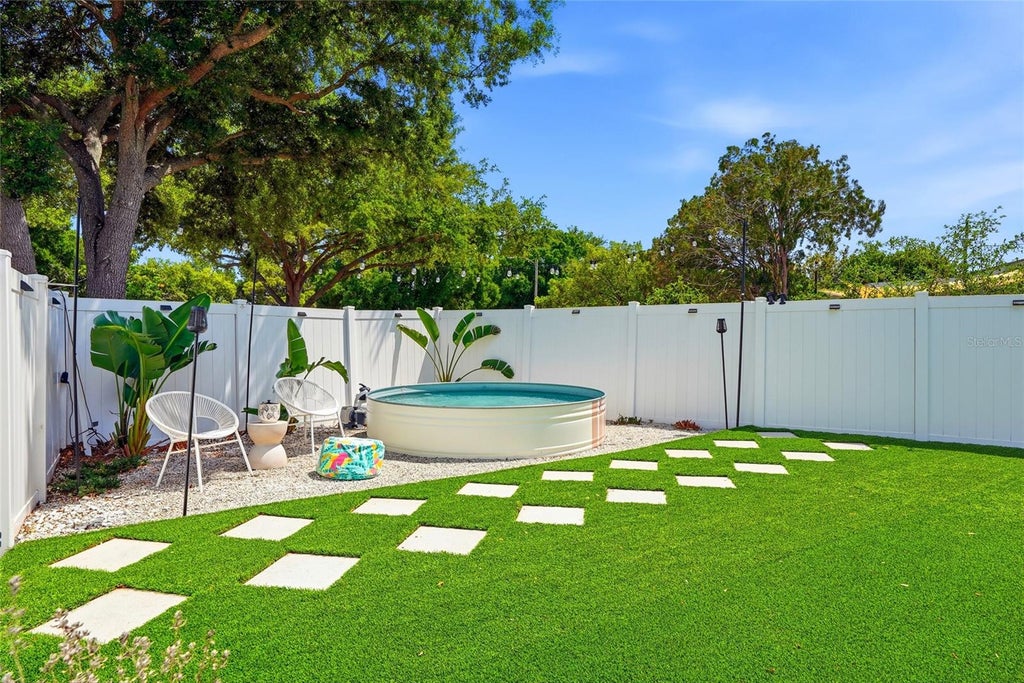 Photo of 1143 Meadowlawn Drive N, St Petersburg, FL 33702 (MLS # TB8535278)