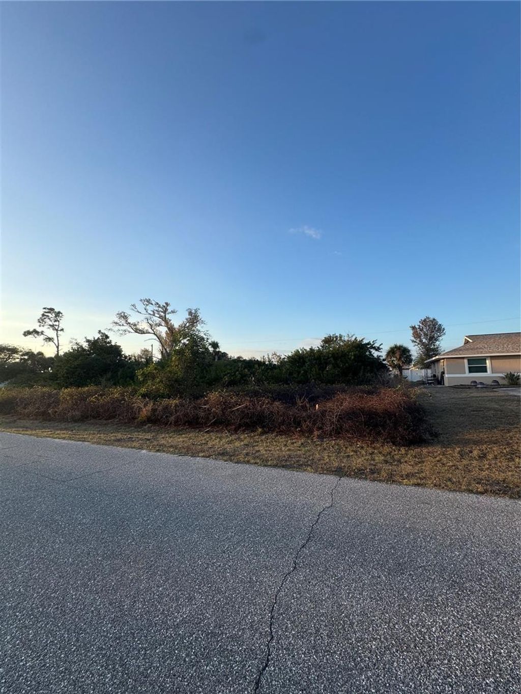 Photo of 10052 Barker Avenue, Englewood, FL 34224 (MLS # A4684780)