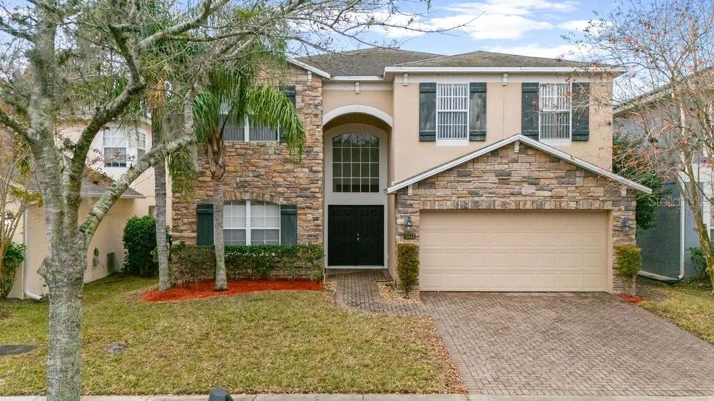 Photo of 12948 Moss Park Ridge Drive, Orlando, FL 32832 (MLS # O6401074)