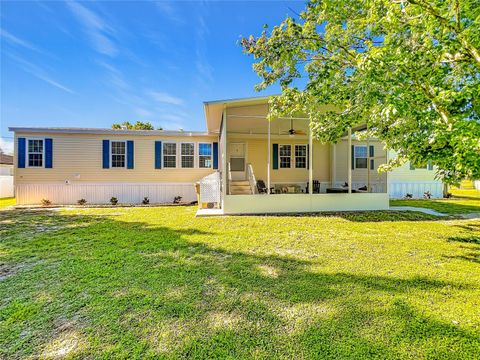 Photo of 9040 Mercury Drive, Saint Cloud, FL 34773 (MLS # O6401250)