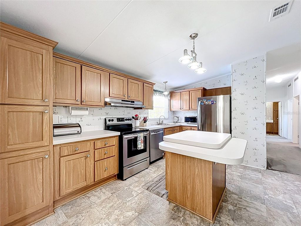 Photo of 9040 Mercury Drive, Saint Cloud, FL 34773 (MLS # O6401250)