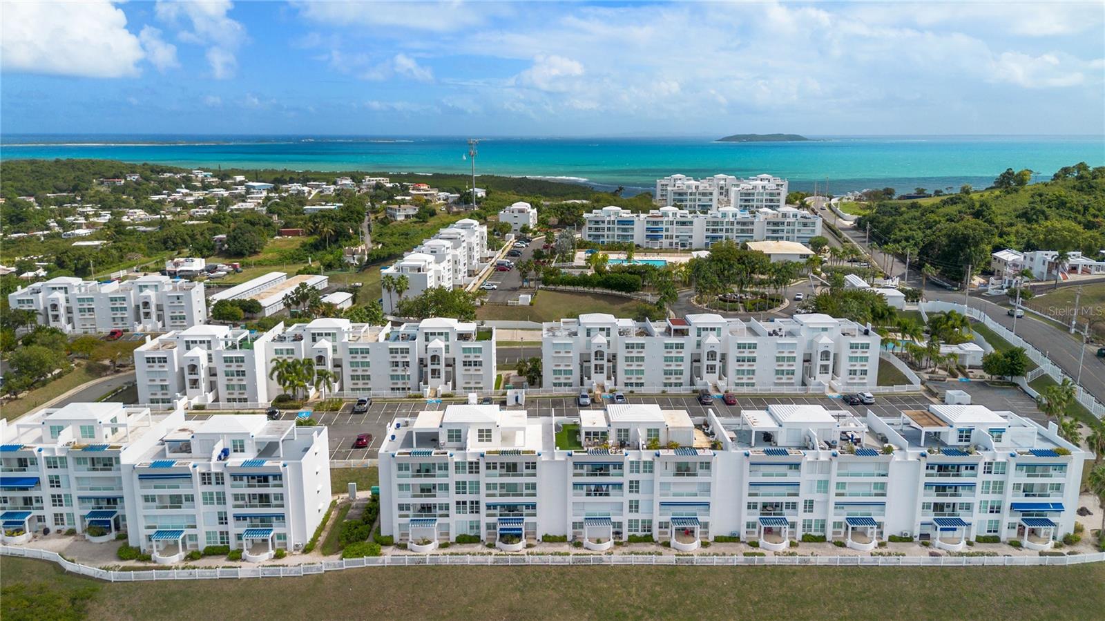 Experience the pinnacle of coastal living in this stunning penthouse with breathtaking ocean views. This fully furnished 4-bedroom, 3-bathroom residence offers an open-concept layout that seamlessly integrates the living and dining areas with a modern kitchen, which flows directly onto the spacious balcony—the perfect spot to enjoy morning coffee while soaking in the endless blue horizon.
The rooftop terrace is a true highlight, where you can feel the refreshing ocean breeze and take in panoramic views—ideal for entertaining or simply unwinding in paradise. Abundant natural light fills the space, enhancing the serene ambiance of this coastal retreat.
The Ocean Club at Seven Seas is renowned for its resort-style amenities, offering residents a lifestyle akin to a permanent vacation. The community features: Two swimming pools, perfect for relaxation and family fun. A fully equipped fitness center, catering to all your wellness needs.
Tennis and basketball courts, as well as a beach volleyball area, for sports enthusiasts.
Plus, a gazebo and game room, providing additional spaces for leisure and social gatherings.
Situated in the picturesque town of Fajardo, the complex is just minutes away from the pristine Seven Seas Beach, known for its clear waters and vibrant marine life. The area offers a variety of local dining options, allowing you to indulge in authentic local cuisine. Additionally, Fajardo serves as a gateway to numerous outdoor adventures, including sailing, snorkeling, and exploring nearby natural reserves.
This is a rare opportunity to own a slice of paradise in one of Puerto Rico's most sought-after coastal communities. Don't miss the chance to make this exquisite penthouse your new home—schedule your private showing today!