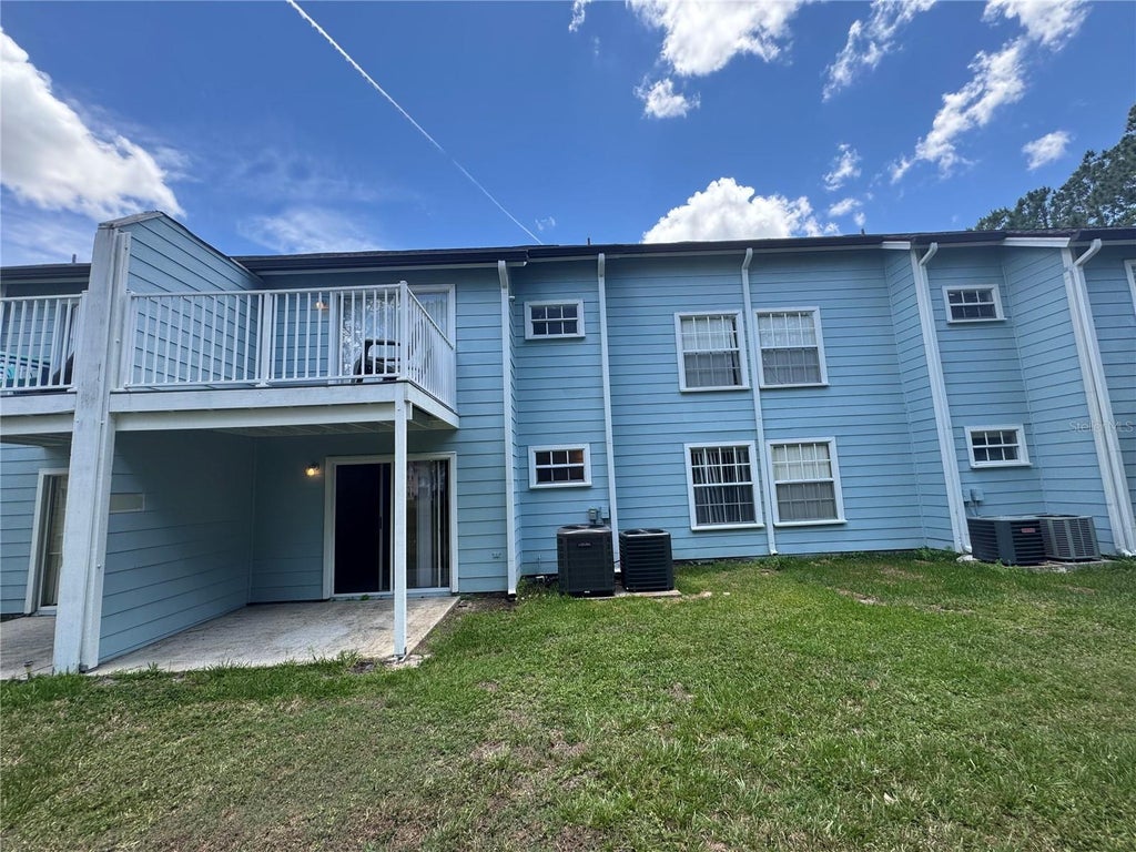 Photo of 2036 Royal Bay Boulevard #57, Kissimmee, FL 34746 (MLS # O6444008)