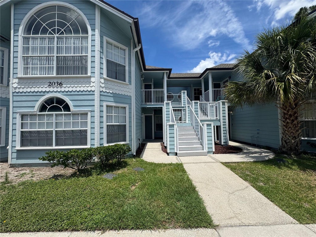 Photo of 2036 Royal Bay Boulevard #57, Kissimmee, FL 34746 (MLS # O6444008)