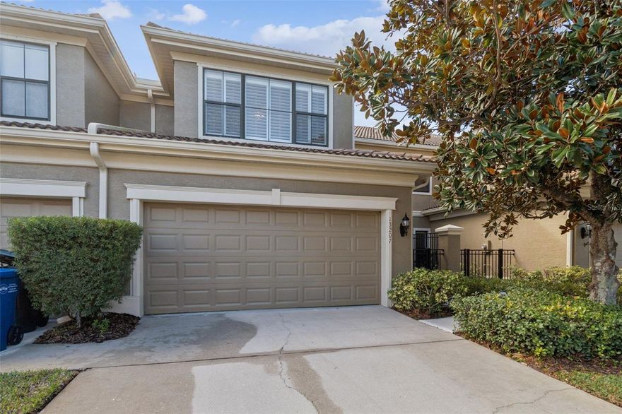 Step into a lifestyle of ease and elegance in this meticulously maintained, block-construction townhome. Located in a quiet, non-flood zone enclave, this 2,215 sq. ft. residence offers the rare convenience of a ground-floor primary suite combined with the security of a "lock-and-leave" community.
The main level is designed for both comfort and entertaining, featuring soaring vaulted ceilings, engineered hardwood floors, and architectural arched doorways that add sophisticated character. The kitchen is a chef’s delight, boasting solid wood cabinetry, granite countertops, and designer tile. Retreat to your primary suite to enjoy a luxurious en suite with a garden tub, separate shower, and a dual sink vanity, or sip your morning coffee on the enclosed lanai overlooking serene green space.
Upstairs, a versatile loft space awaits—perfect for a home office, media room, or gym—alongside two additional spacious bedrooms. Whether you are hitting the links at the Largo Golf Course (literally steps away), biking to Indian Rocks Beach, or enjoying the Olympic-sized pool at the nearby Southwest Recreation Complex, this home puts the best of Florida living at your doorstep. The low quarterly HOA fee includes exterior and grounds maintenance, community pest control, private roads and escrow reserves including the roofs.  Furnishings are negotiable outside the purchase contract.