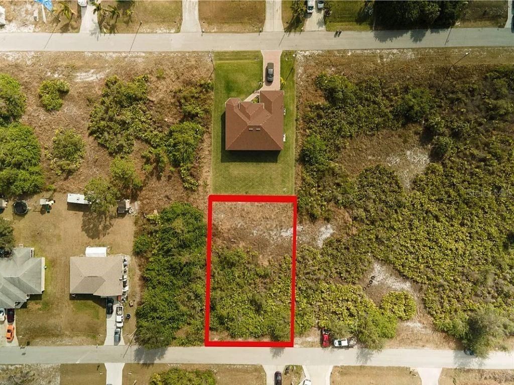 Photo of 2613 3rd Street SW, Lehigh Acres, FL 33976 (MLS # S5133362)