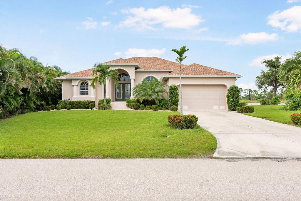 Photo of 1128 Rotonda Circle, Rotonda West, FL 33947 (MLS # D6143930)