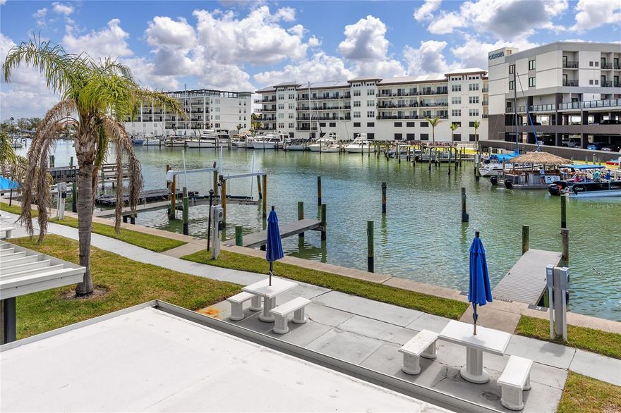 Experience the best of beachside living with this charming, completely updated one-bedroom, one-bath unit at Madeira Beach Yacht Club, offering direct waterfront views of the Intracoastal Waterway through two enormous picture windows. The unit features two sizable closets, a dining area, an in-unit washer and dryer, and the added peace of mind of an AC replacement completed in August 2025. Located in a gated community known for its vibrant coastal lifestyle, this unit is not only an ideal personal retreat but also a smart investment opportunity, with weekly short-term rentals allowed. Sit right outside your unit and soak in the sun, or stay active while enjoying the two heated pools and four fishing piers—just some of the amenities available to residents and guests. The location is unbeatable, with walkable access to local restaurants, the Cambria Hotel’s rooftop lounge, and all the charm of Madeira Beach. Just cross Gulf Boulevard and you’re on the soft white sands of the Gulf, perfectly positioned to catch those iconic Florida sunsets. The surrounding area is full of activity and convenience, featuring nearby tennis courts, basketball courts, baseball fields, a public library, and a shopping plaza. Whether you’re looking for a relaxing getaway or a high-performing rental, this unit delivers the perfect blend of comfort, location, and coastal charm.