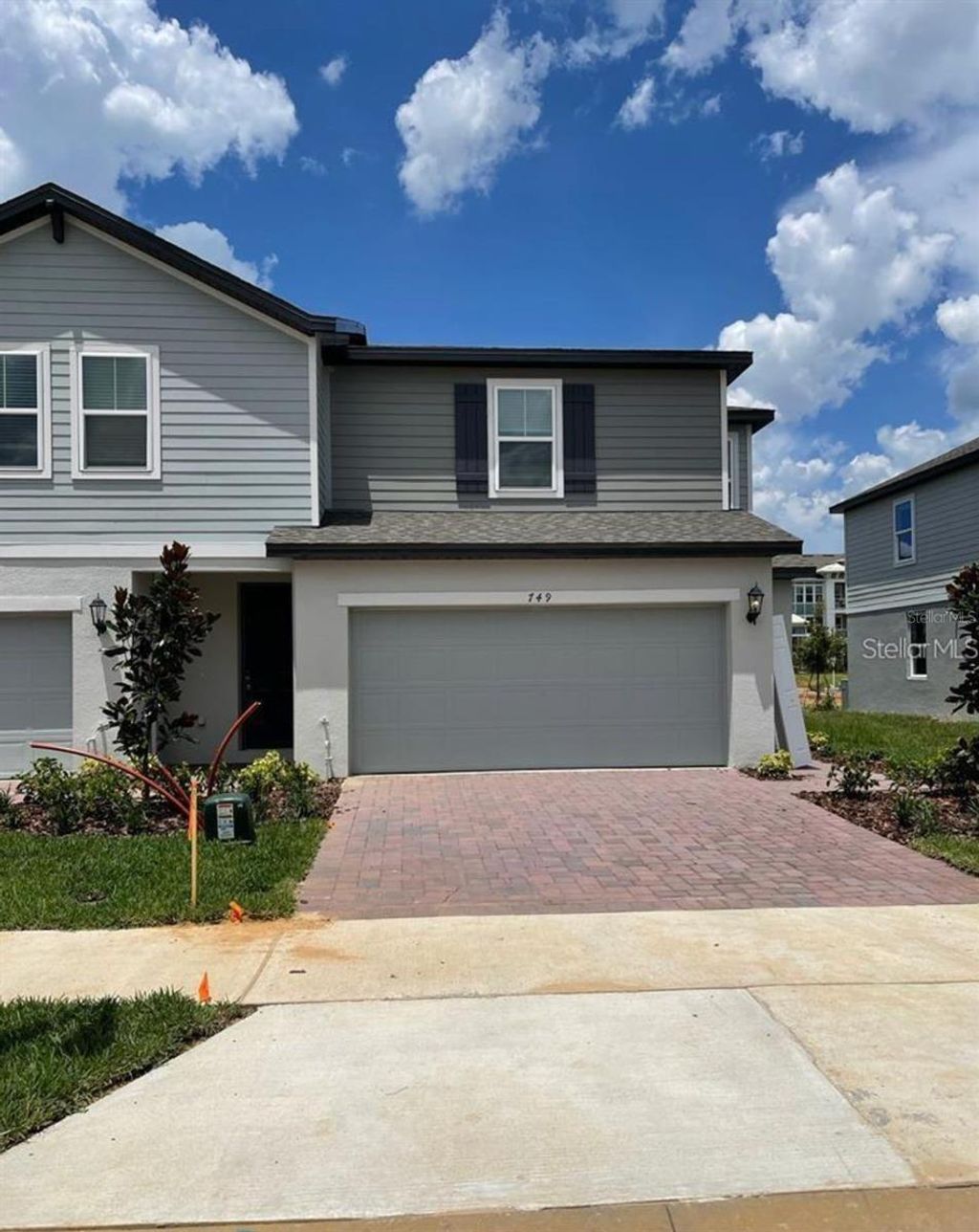 Photo of 749 Legacy Drive, Davenport, FL 33896 (MLS # O6396108)