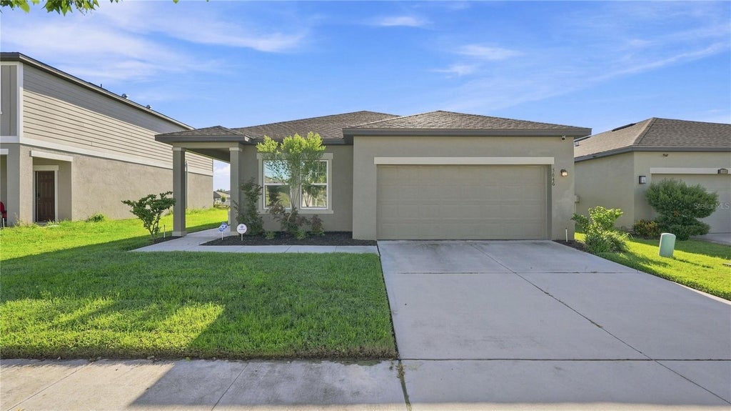 Photo of 5646 Alexander Springs Place, Lakeland, FL 33811 (MLS # TB8546636)